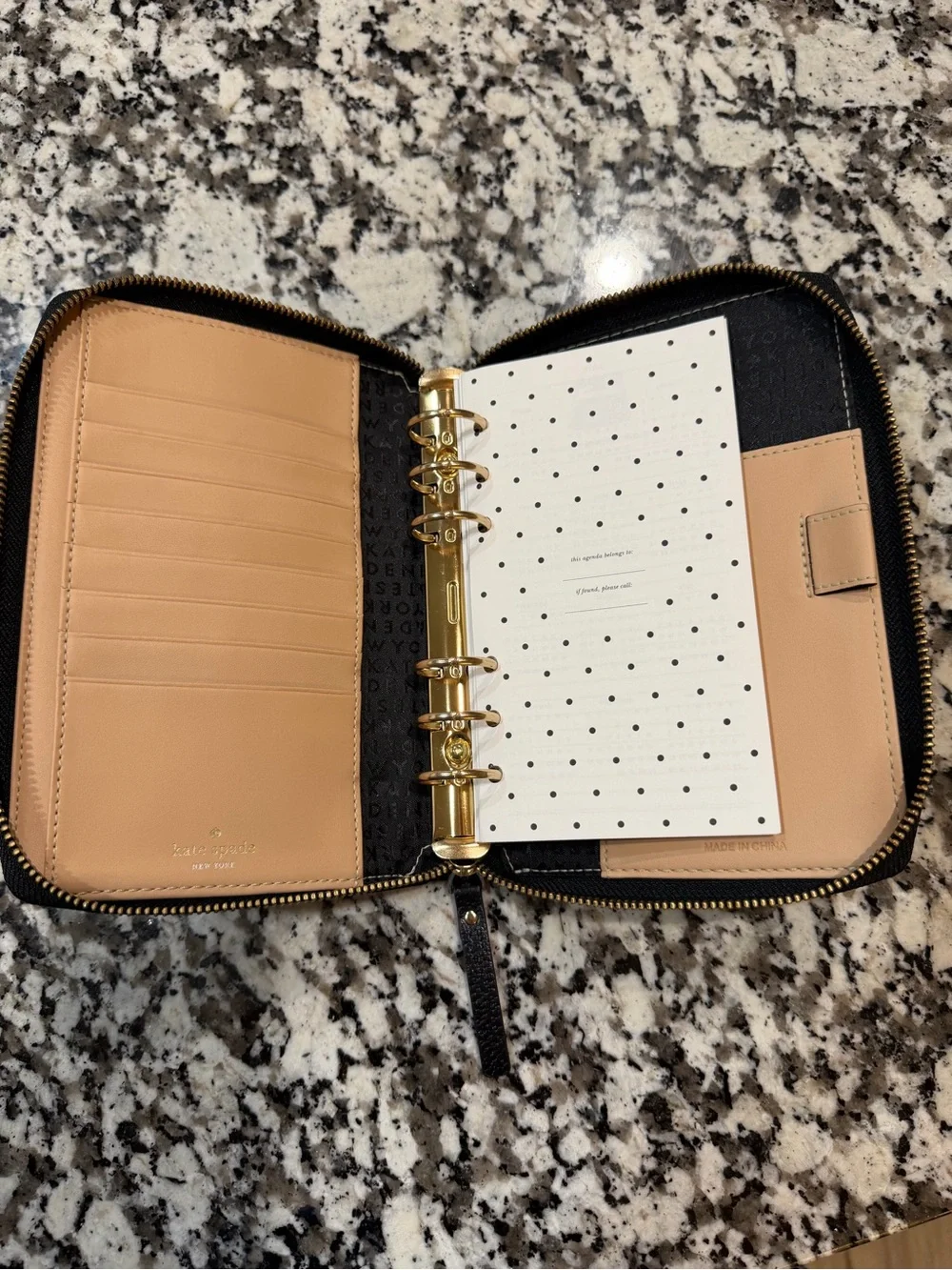 kate spade Black Pebbled Leather Zip Wallet with Gold Logo